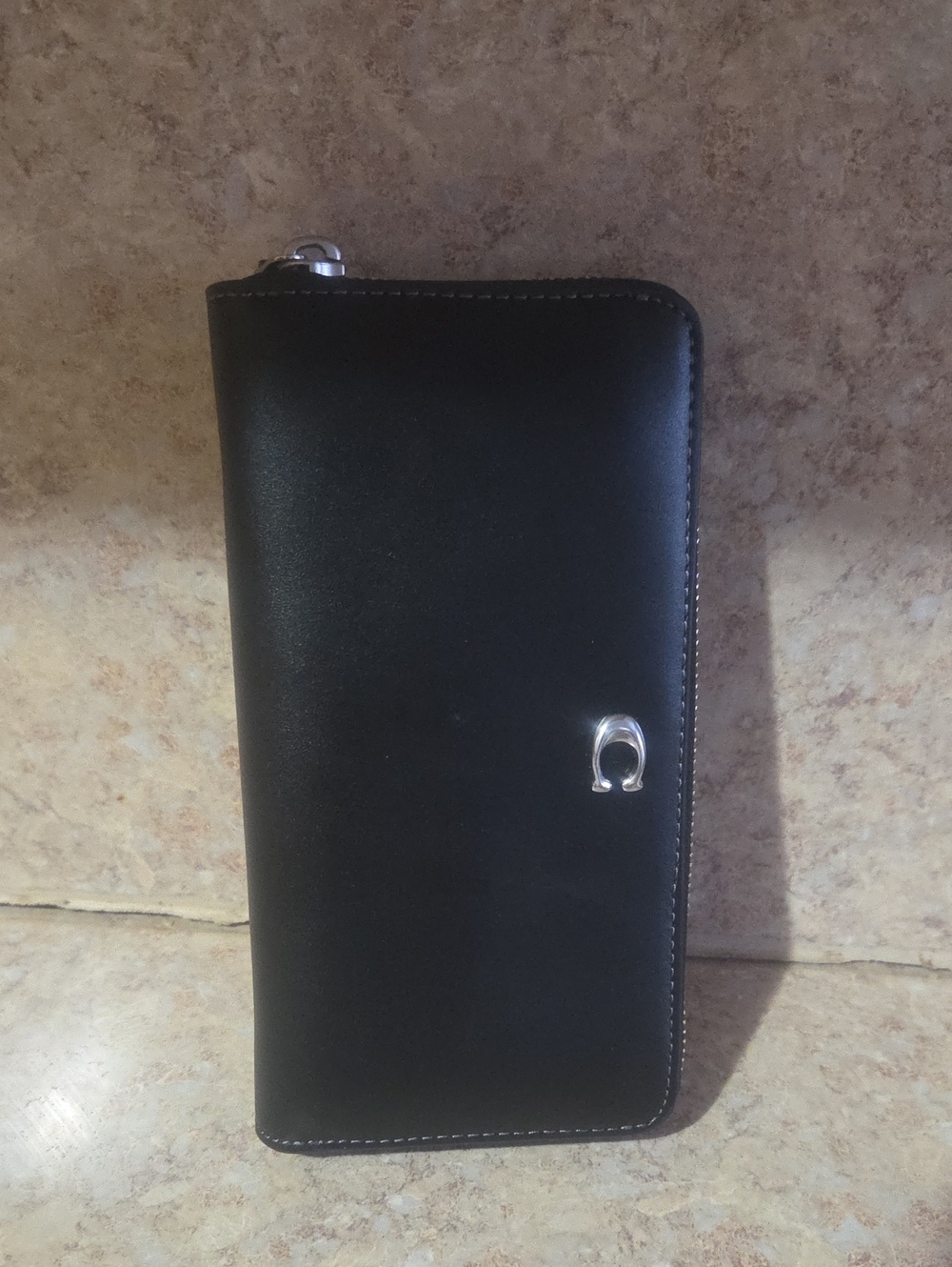 Coach Black Leather Zip Clutch with Gold 'C' Accent